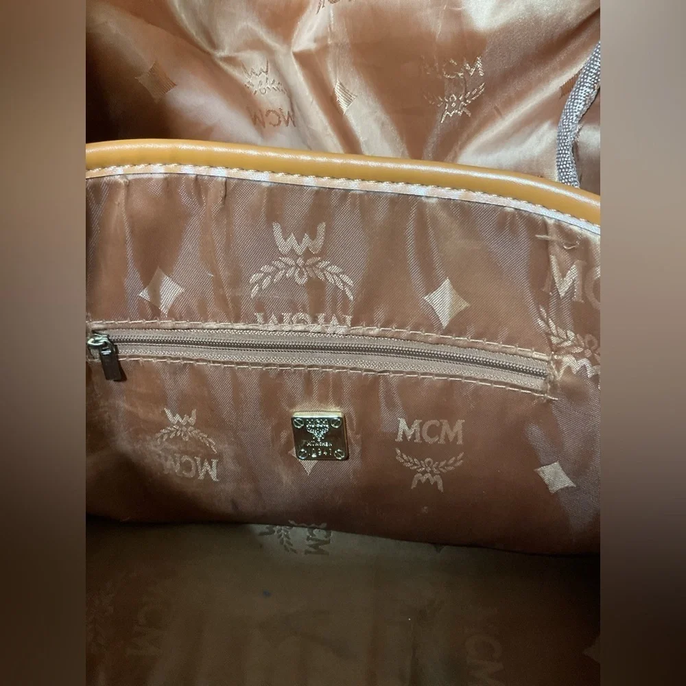 MCM Tan Backpack with Iconic Monogram Design